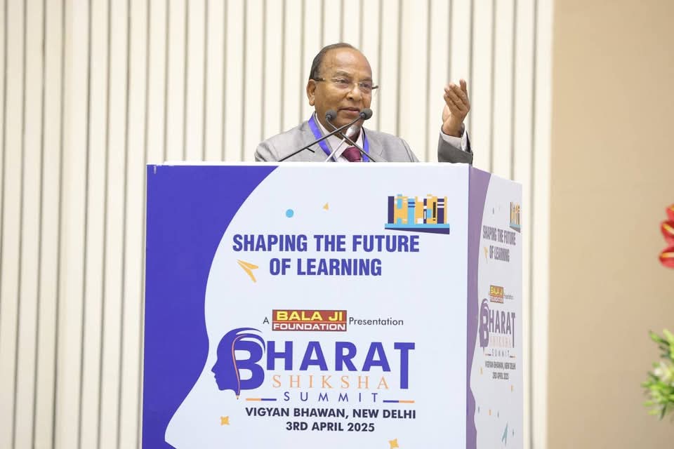 Dr. Bhim Sen Singh speaking at podium